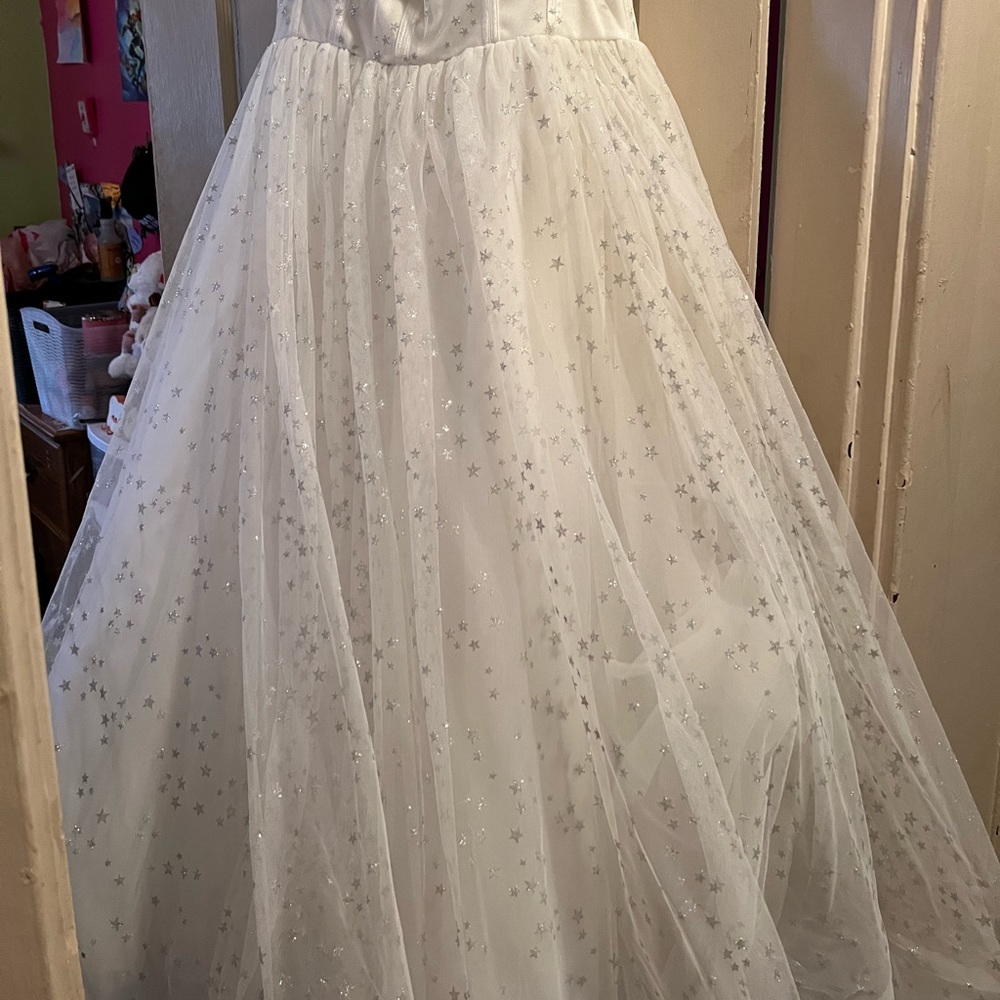 white prom dress with silver stars